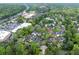 Aerial view of neighborhood with lush greenery and well-maintained homes, showcasing a serene and desirable community at 53 Paces West Nw Dr, Atlanta, GA 30327