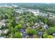 Aerial view of a charming neighborhood with lush greenery and mature trees, creating a serene and private setting at 53 Paces West Nw Dr, Atlanta, GA 30327