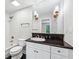 Bathroom featuring tiled tub, granite countertop, and modern fixtures at 53 Paces West Nw Dr, Atlanta, GA 30327