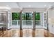 The kitchen area opens to a lovely deck through folding french doors at 53 Paces West Nw Dr, Atlanta, GA 30327