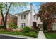 Charming two-story home featuring beautifully landscaped front yard and classic architectural details at 53 Paces West Nw Dr, Atlanta, GA 30327