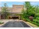 Whole Foods Market entrance featuring lush greenery and convenient underground parking, providing easy access for shoppers at 53 Paces West Nw Dr, Atlanta, GA 30327