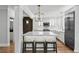 Modern kitchen features stainless appliances, a large island, and pendant lighting at 53 Paces West Nw Dr, Atlanta, GA 30327