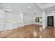 Open living space with hardwood floors, built-in shelving, and modern lighting at 53 Paces West Nw Dr, Atlanta, GA 30327
