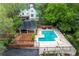 Aerial view of a refreshing pool and outdoor lounge area, perfect for relaxation and entertaining in style at 53 Paces West Nw Dr, Atlanta, GA 30327