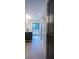 Bathroom boasts dual sinks, a tiled floor, and a shower with glass door allowing for natural light from the backyard at 541 Earlvine Nw Way, Kennesaw, GA 30152