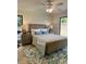 Cozy bedroom showcasing a comfortable bed, tasteful decor, and natural light from windows at 541 Earlvine Nw Way, Kennesaw, GA 30152