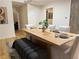 Bright dining room featuring hardwood floors, a modern table, comfortable seating, and ample space at 541 Earlvine Nw Way, Kennesaw, GA 30152