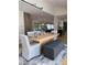 Bright dining room with modern table and chairs, plus a stylish bench at 541 Earlvine Nw Way, Kennesaw, GA 30152