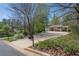 Long concrete driveway leading to detached two-car garage at 541 Earlvine Nw Way, Kennesaw, GA 30152