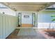 Covered front entrance with double glass doors and modern accents to the home at 541 Earlvine Nw Way, Kennesaw, GA 30152