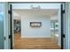 Entryway leading to the living spaces features hardwood floors and contemporary decor at 541 Earlvine Nw Way, Kennesaw, GA 30152