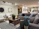 Spacious living room with contemporary furniture, artistic decor, and open layout at 541 Earlvine Nw Way, Kennesaw, GA 30152