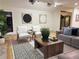 Bright living room with contemporary furniture, artful decor, and comfortable seating at 541 Earlvine Nw Way, Kennesaw, GA 30152