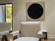 Sitting area with natural light, neutral furniture and decor with modern art at 541 Earlvine Nw Way, Kennesaw, GA 30152