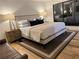 Inviting main bedroom features a comfortable bed and elegant nightstands at 541 Earlvine Nw Way, Kennesaw, GA 30152