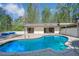 Inviting backyard pool with patio and modern design of home visible in the background at 541 Earlvine Nw Way, Kennesaw, GA 30152