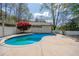 Sparkling pool surrounded by well-maintained landscaping and privacy fencing at 541 Earlvine Nw Way, Kennesaw, GA 30152