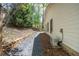 View of side yard, with rock path and clean siding at 541 Earlvine Nw Way, Kennesaw, GA 30152