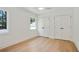 This bedroom features white walls, wood floor and two double door closets at 2198 Oakawana Ne Dr, Atlanta, GA 30345