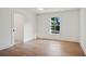 Bedroom with a large window and wood floors at 2198 Oakawana Ne Dr, Atlanta, GA 30345