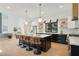 Bright kitchen featuring a center island with seating, stainless steel appliances, and hardwood floors at 2198 Oakawana Ne Dr, Atlanta, GA 30345