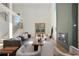 Inviting living room featuring a modern fireplace, hardwood floors, and lots of natural light at 2198 Oakawana Ne Dr, Atlanta, GA 30345