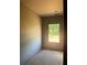 Unfinished bedroom with a window offering natural light at 3108 Marbella Cir # 4, Kennesaw, GA 30152