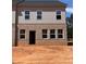 Exterior featuring gray siding and brick details under construction at 3108 Marbella Cir # 4, Kennesaw, GA 30152