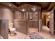 Finished basement bathroom featuring stand-up tiled shower and neutral colors at 622 Goldpoint Trce, Woodstock, GA 30189