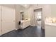 Bright bathroom featuring double sinks, modern fixtures, and a large mirror at 622 Goldpoint Trce, Woodstock, GA 30189