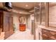 Finished basement bathroom with stand-up shower, vanity, and custom tile floor at 622 Goldpoint Trce, Woodstock, GA 30189