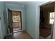 Entryway showcasing the front entrance, and with view into the storage room and the yard at 1130 Ridge Ave, Stone Mountain, GA 30083