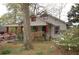 Charming home with a covered porch, well-maintained landscaping, and inviting curb appeal at 1130 Ridge Ave, Stone Mountain, GA 30083