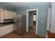 This kitchen offers stainless steel appliances, lots of cabinet storage and a window to the outside at 1130 Ridge Ave, Stone Mountain, GA 30083