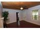 Comfortable living room with wooden floors, fireplace, natural light, and easy access to other rooms at 1130 Ridge Ave, Stone Mountain, GA 30083