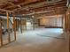 An unfinished basement with exposed beams and framing, ready for customization at 139 Stargaze Rdg, Canton, GA 30114