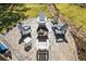 Overhead view of a fire pit surrounded by Adirondack chairs, perfect for outdoor gatherings at 139 Stargaze Rdg, Canton, GA 30114