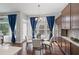 Eat-in kitchen featuring hardwood floors, ample storage, and a glass-top table, ideal for Gathering meals at 139 Stargaze Rdg, Canton, GA 30114