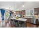Stylish kitchen with granite countertops, stainless steel appliances, island with seating, and ample cabinet space at 139 Stargaze Rdg, Canton, GA 30114