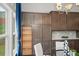 Charming kitchen cabinets with a built-in pantry and granite countertops, with natural light from the window at 139 Stargaze Rdg, Canton, GA 30114