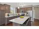 Spacious kitchen with granite countertops, stainless steel appliances, and a large island with bar seating at 139 Stargaze Rdg, Canton, GA 30114