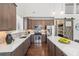 Modern kitchen featuring quartz countertops, stainless steel appliances, and a large island with seating at 139 Stargaze Rdg, Canton, GA 30114
