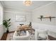 Bright office featuring wainscoting, light gray walls, hardwood floors, and an area rug at 139 Stargaze Rdg, Canton, GA 30114