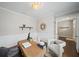 Office with open doorway, light gray walls, hardwood floors, and an area rug at 139 Stargaze Rdg, Canton, GA 30114