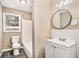 Bathroom featuring a single sink vanity and a tub/shower combo at 165 Holly Nw Rd, Atlanta, GA 30314