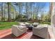 Backyard deck seating with covered furniture at 1665 Millhouse Lndg, Marietta, GA 30066