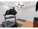 Home gym equipped with a treadmill, workout mats, and weights for convenient fitness activities at 1665 Millhouse Lndg, Marietta, GA 30066