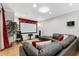 Relaxing home theater with a large screen, plush seating, and ambient lighting for immersive movie nights at home at 1665 Millhouse Lndg, Marietta, GA 30066