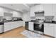 Kitchen with stainless steel appliances, and white cabinets at 1665 Millhouse Lndg, Marietta, GA 30066